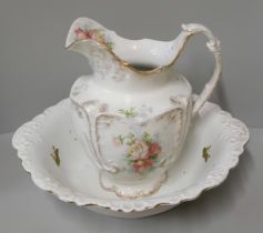 A porcelain wash jug and bowl