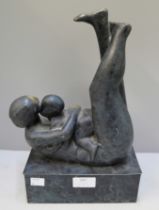 An abstract bronze figure