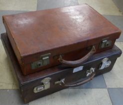 Two brown leather brief cases