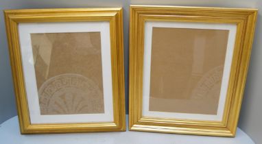 A collection of assorted picture frames
