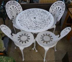 A painted cast alloy garden table and four chairs