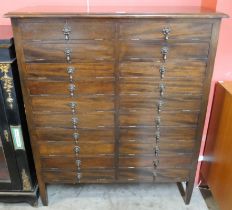 An Edward VII mahogany twenty drawer filing cabinet