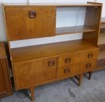 A teak highboard