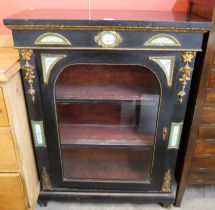 A 19th Century French ebonised and ormolu pier cabinet, with Sevres style porcelain mounts