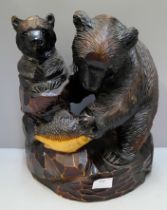 A Japanese carved softwood figure of bears