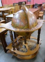 An Italian terrestrial globe cocktail cabinet/trolley