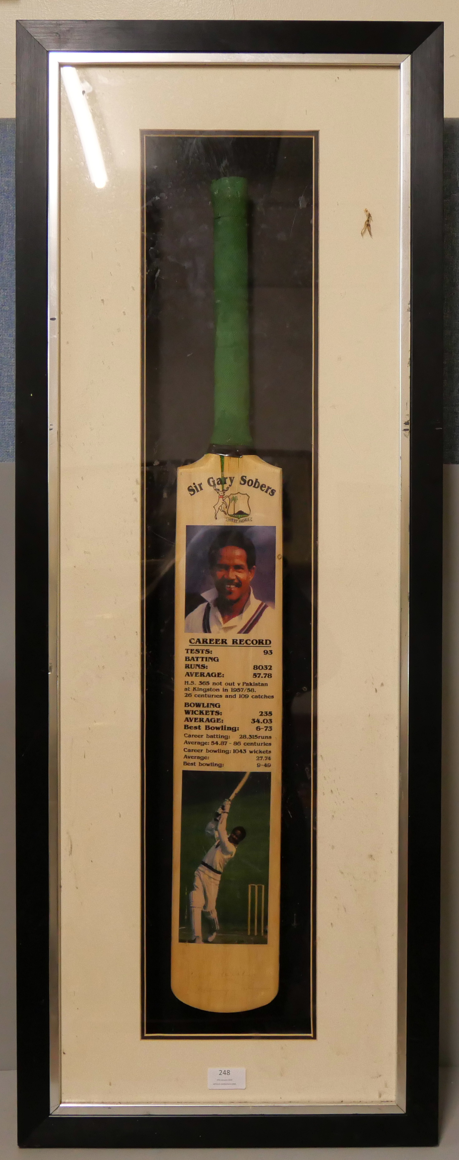 A commemorative, signed Sir Gary Sobers cricket bat