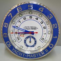 A Rolex style dealer's clock