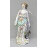 A 19th Century porcelain figure of Juno and the Peacock, 26.5cm