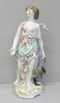 A 19th Century porcelain figure of Juno and the Peacock, 26.5cm