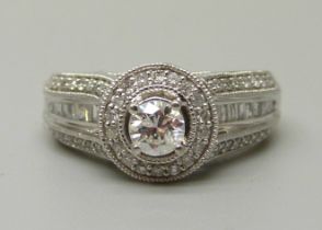 A 10ct white gold and 83 stone diamond ring, centre diamond 0.35ct plus 82 0.01 diamonds, total