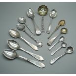 A collection of silver spoons including a sifter spoon, 155g