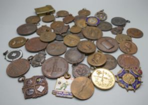 A collection of fobs and medallions including Rifle Club related, Georgian and Victorian coins
