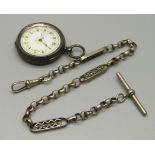 A 935 silver fob watch lacking glass and one hand with a fancy link Albert chain