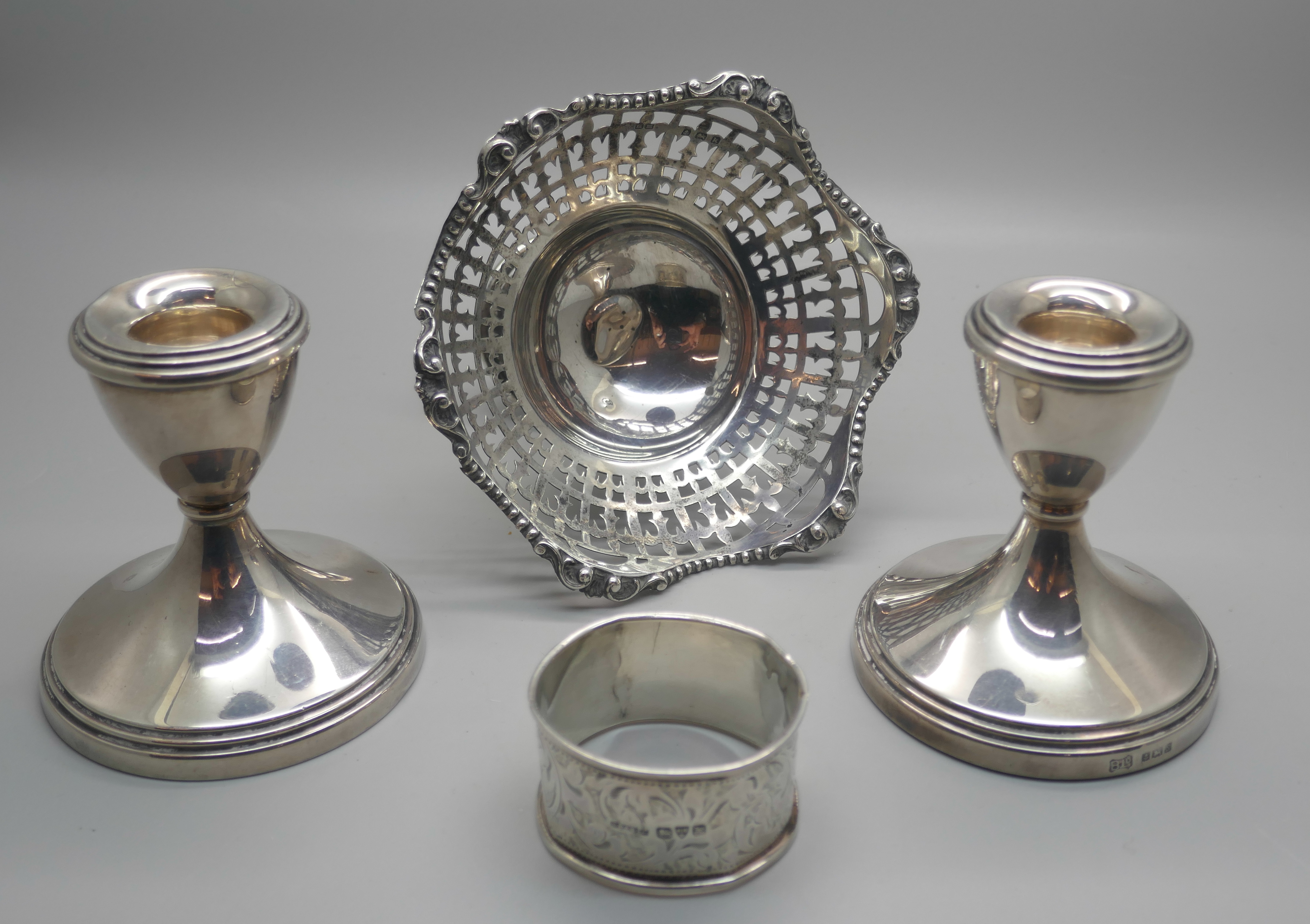 A pair of silver dwarf candlesticks, a silver pedestal bon-bon dish and a silver napkin ring, ( - Image 6 of 6