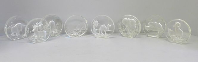 A complete set of eight 3D engraved wildlife crystals from The Danbury Mint, West Germany