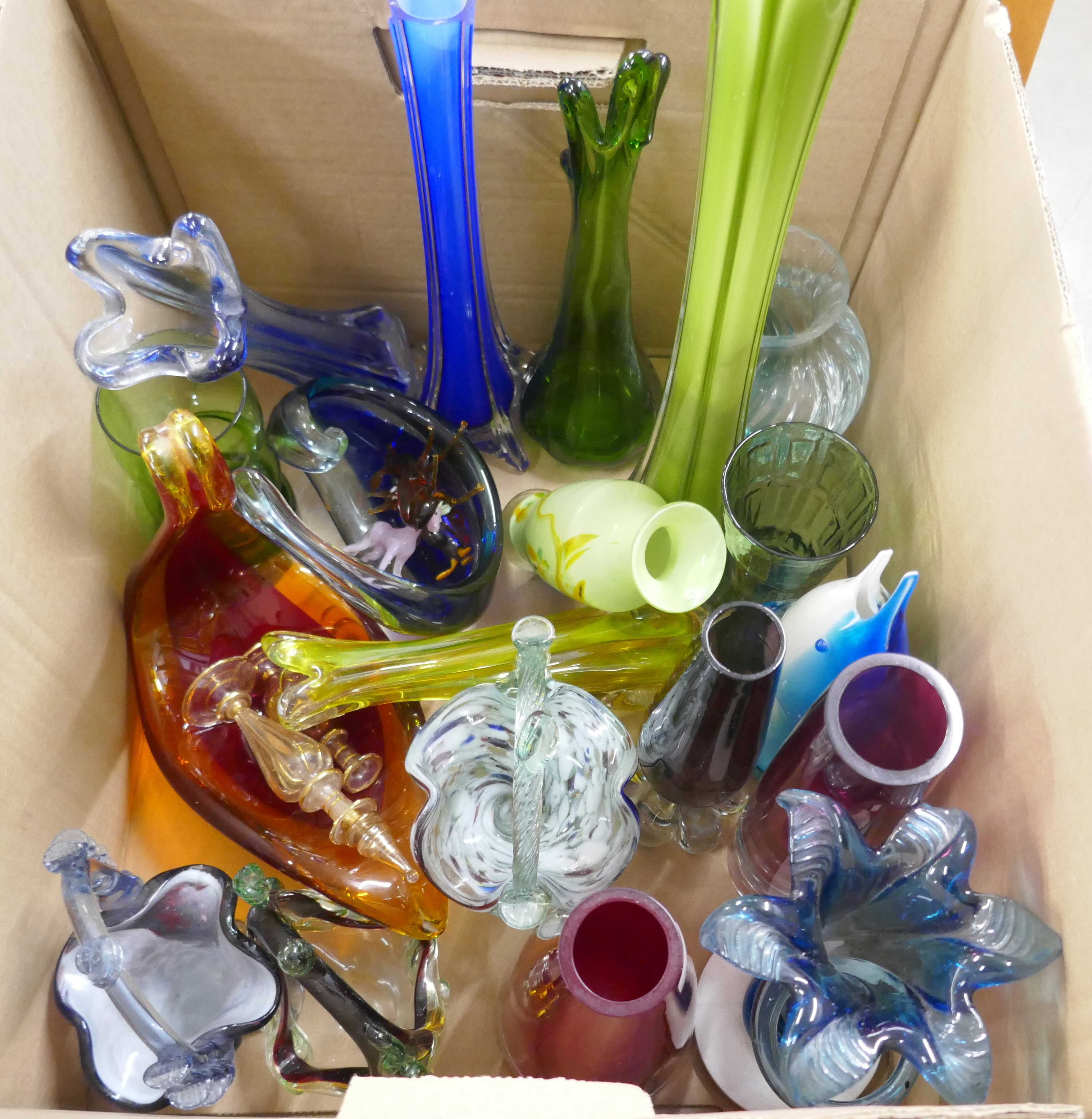 A collection of coloured art glass including mid Century, Dartington, Murano, small glass animals,
