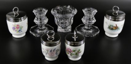 A Baccarat glass pot, a pair of Baccarat candlestick holders, and four Royal Worcester egg coddlers,