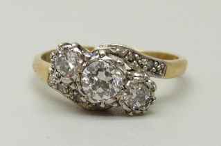 An 18ct gold and diamond ring, approximately 0.60ct diamond weight, 3.2g, M