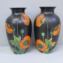 A pair of Crown Ducal vases decorated with poppies, 17.5cm