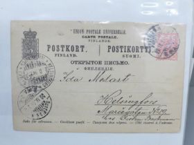 Stamps; an album of worldwide postal stationery (100 items)