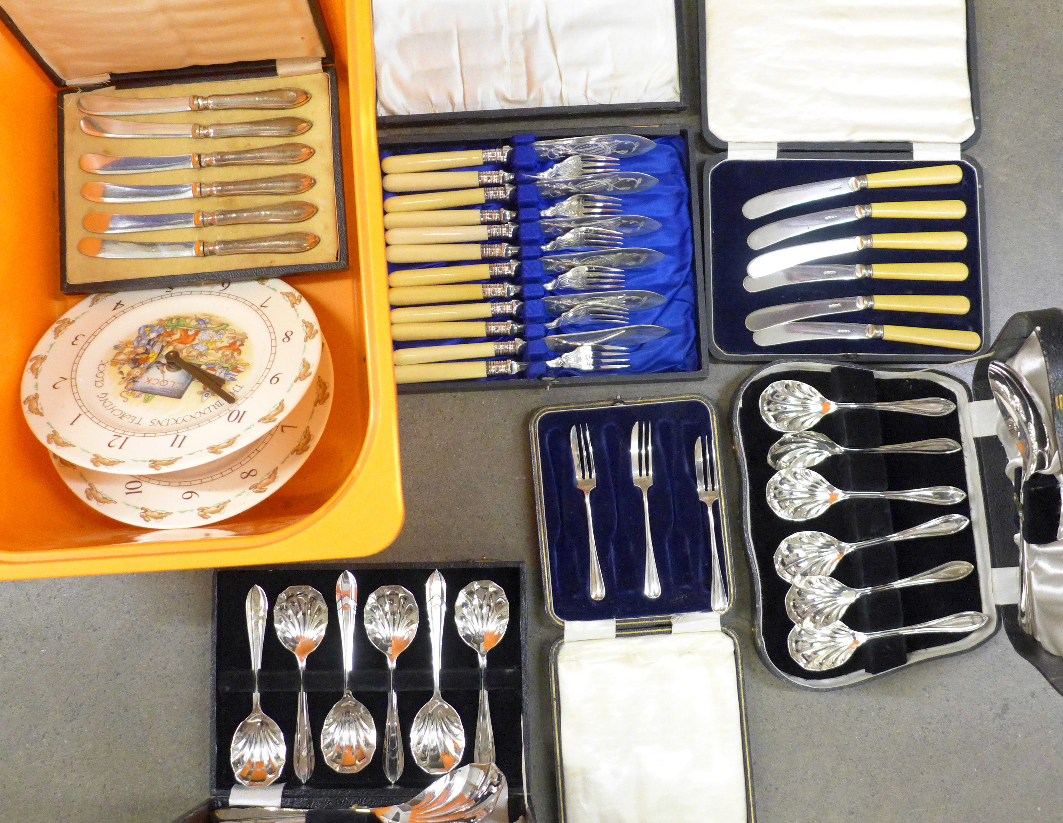 Six silver handled butter knives, cased, a collection of plated flatware, cased and two Royal