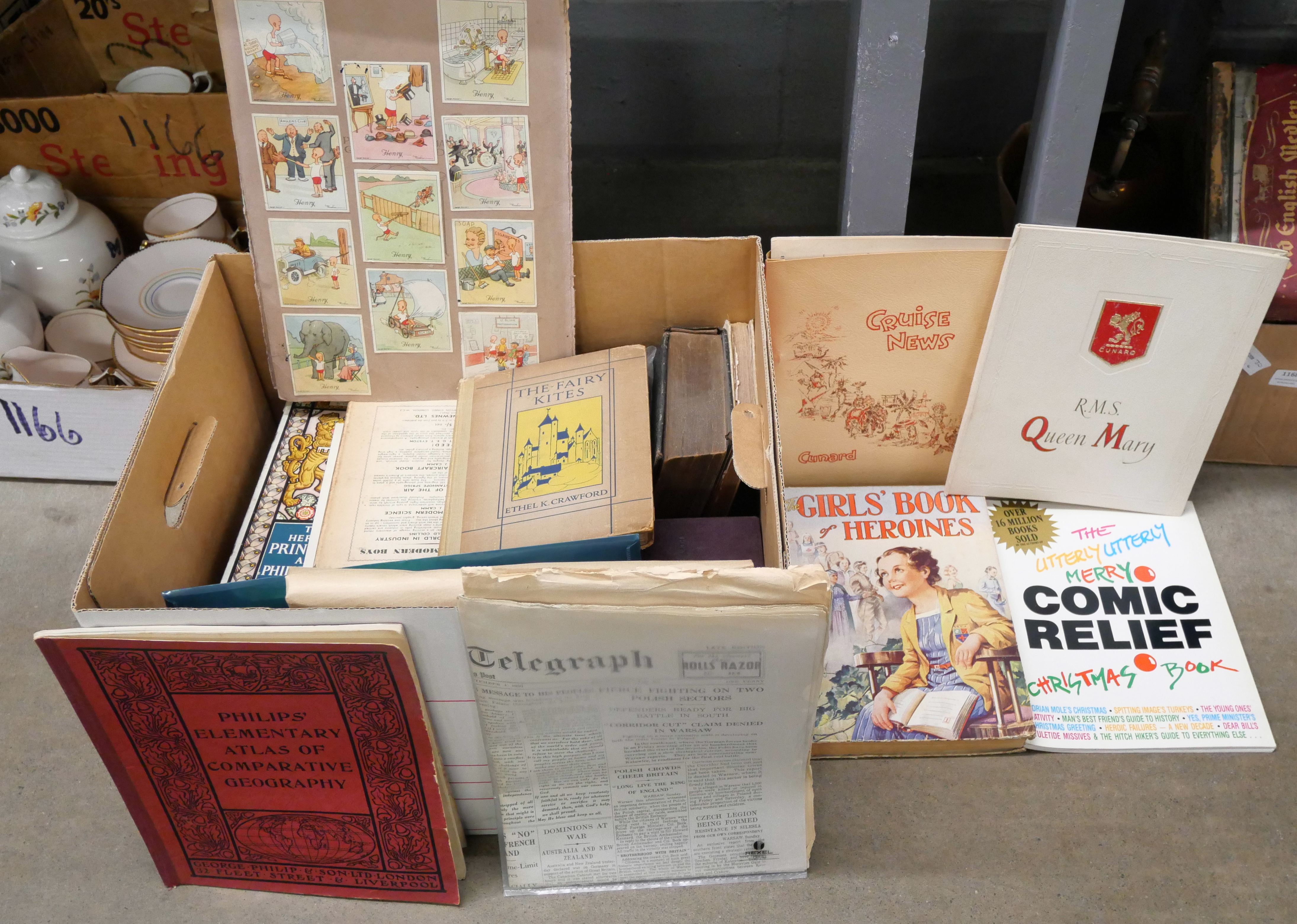 A box of books etc., The Fairy Kites, Cunard Lines Queen Mary and Cruise News, Ladybird books, Scout