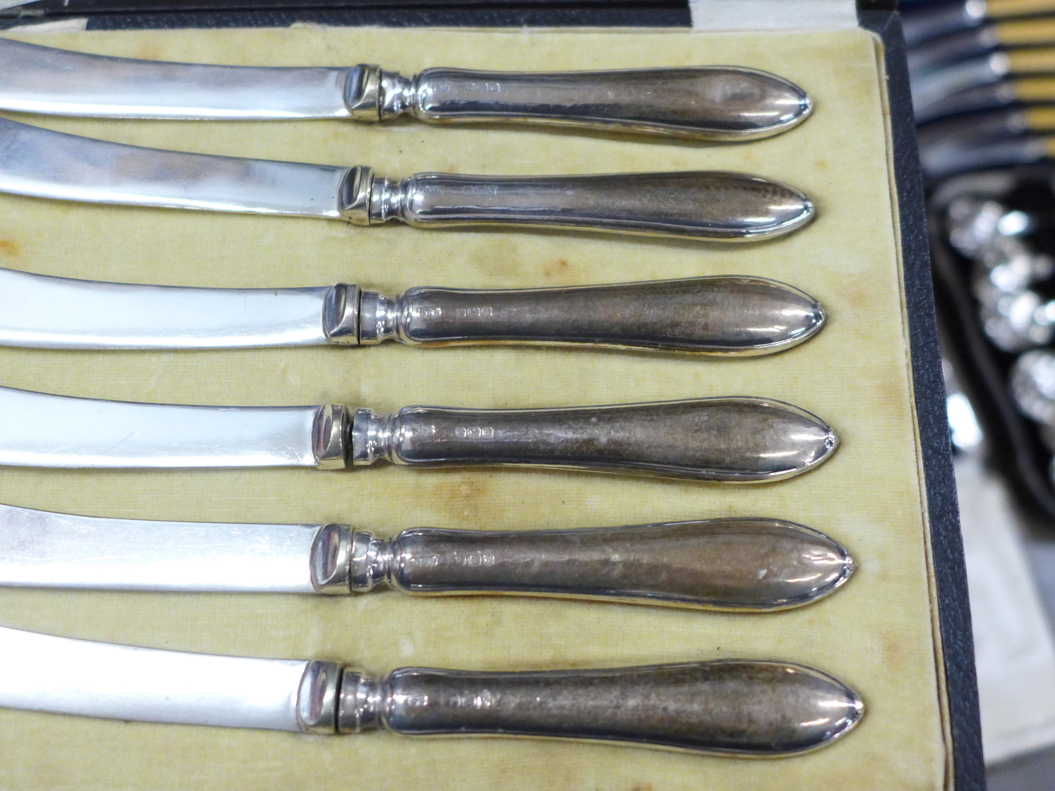 Six silver handled butter knives, cased, a collection of plated flatware, cased and two Royal - Image 2 of 2