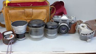 A Zeiss camera, model 207512, in leather case, with pro-Tasser 1:4 f=35 lens, another 36591217 f=115