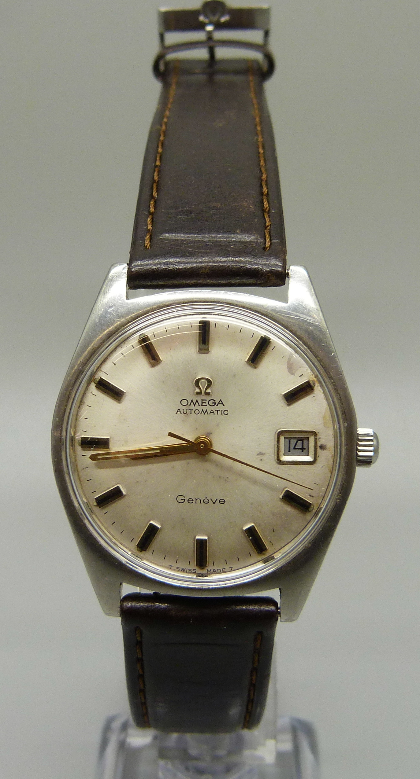 An Omega Geneve automatic date display wristwatch, with original buckle and an Omega carrier box