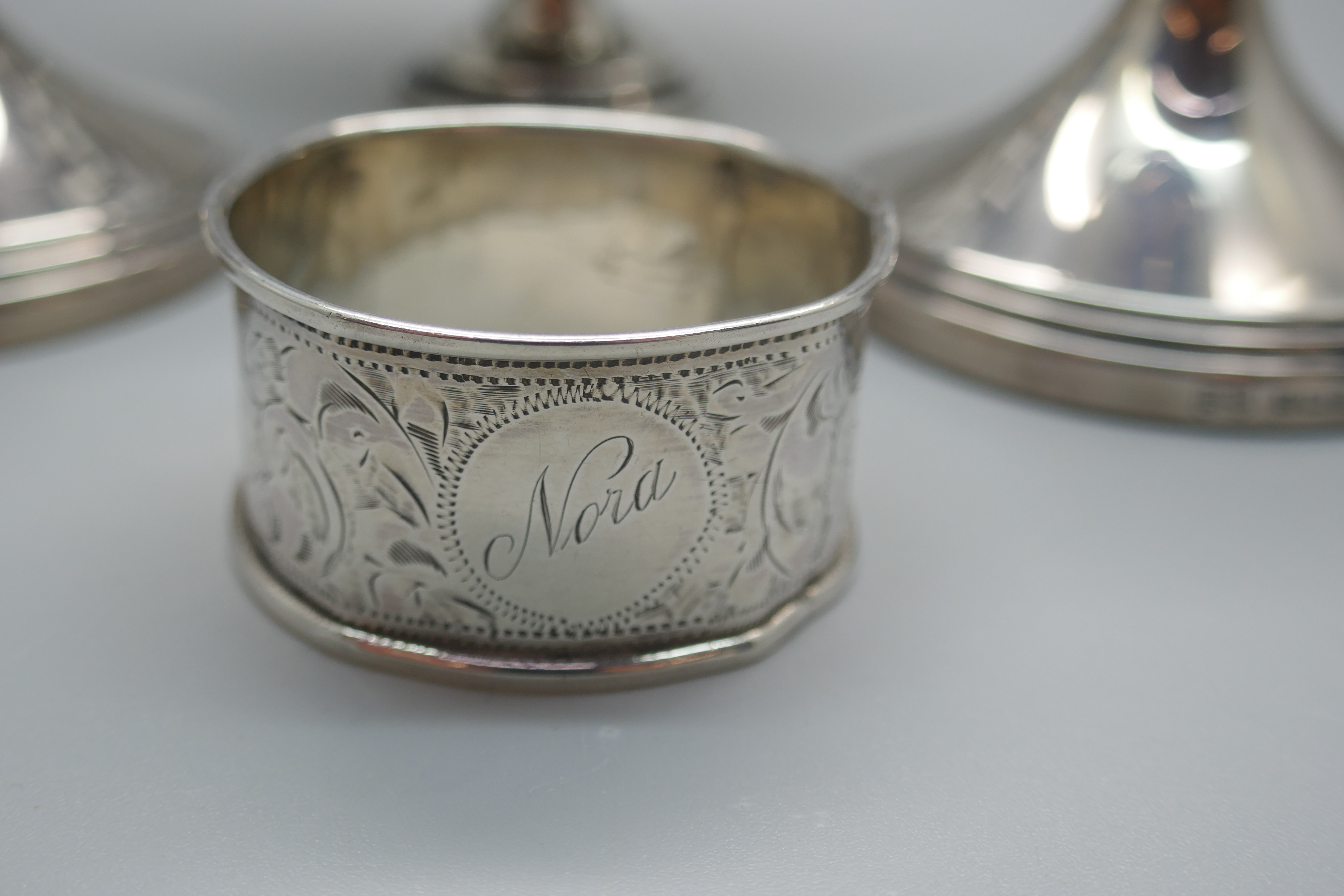 A pair of silver dwarf candlesticks, a silver pedestal bon-bon dish and a silver napkin ring, ( - Image 2 of 6