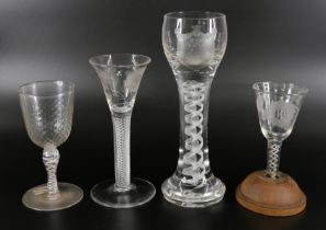 Two Jacobite wine glasses, circa 1900, a double series opaque twist cordial glass with finely