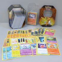 30 Holo/reverse holo, 300 common/uncommon and rare Pokemon cards