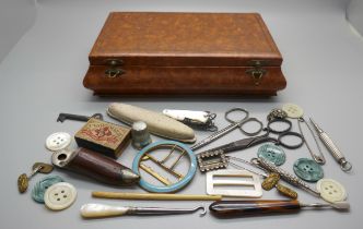 Assorted items including a novelty cheroot cutter, buckle, scissors, mother of pearl handled