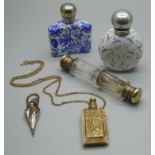 Five scent bottles; a blue and white porcelain scent flask, a Victorian clear glass double ended,