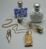 Five scent bottles; a blue and white porcelain scent flask, a Victorian clear glass double ended,