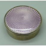 A silver and enamel pill box, 35mm diameter