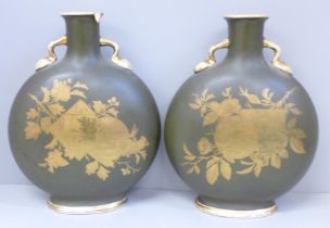 A pair of Charles Barlow Staffordshire moon flask vases with oriental decoration, one a/f (rim