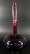 Bob Crooks, a spiral glass decanter in amethyst and ruby, engraved signature to the base, 33cm