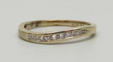 A 9ct gold, eleven stone diamond ring, 1.5g, L