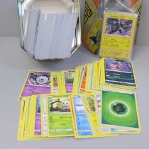 30 Holo/reverse holo, 300 common/uncommon and rare Pokemon cards