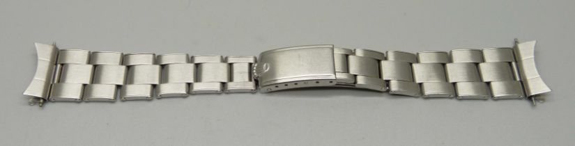 A vintage Rolex bracelet strap with adjustable strap, ref 57, possibly 1957, length 16cm at smallest