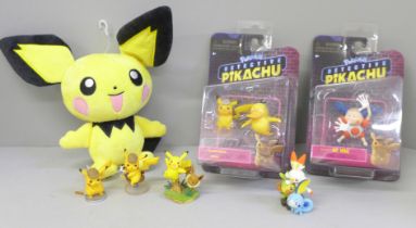 A collection of Pokemon figures and plush, including Mr Mime, Psyduck and Pikachu