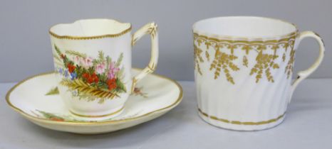 A 19th Century Royal Worcester cup and saucer decorated with sprays of flowers, cup a/f, hairline,