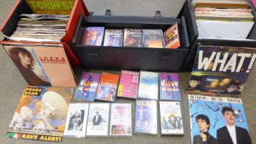 Three cases of 7" singles and cassette tapes