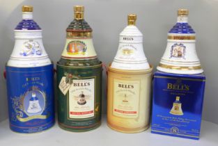 Four Wade Bell's Whisky decanters; three Extra Special and a 1990 Princes Eugenie