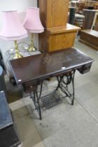 A Bradbury sewing machine table