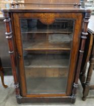 A Victorian inlaid walnut music cabinet