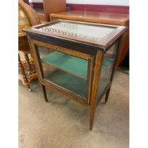 An inlaid Edwardian display table