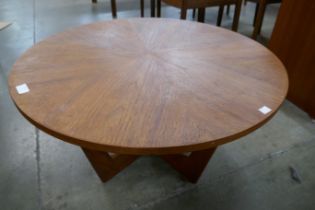 A Danish teak circular sunburst coffee table